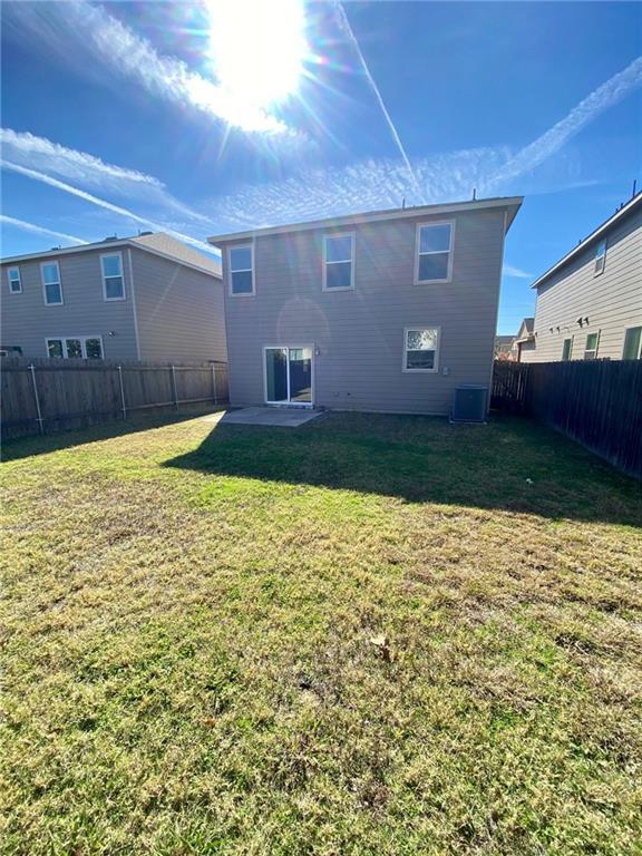 6412 Garden Rose Path Austin, TX 78754 - Photo 15 of 15 a view of back yard of the house