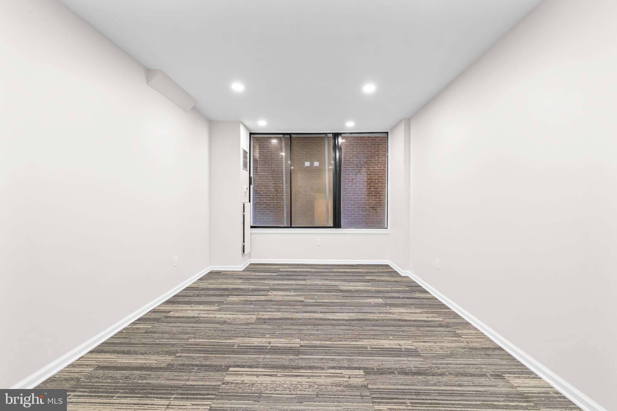 1615 Q Street Northwest, Unit T1 Washington, DC 20009 - Photo 21 of 42 a view of an empty room