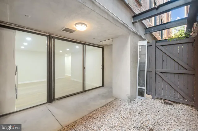 a house view with a sitting space and garden space