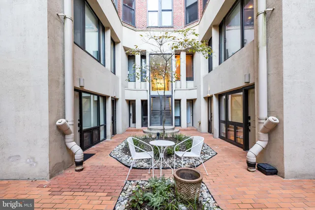 a view of a terrace with seating area