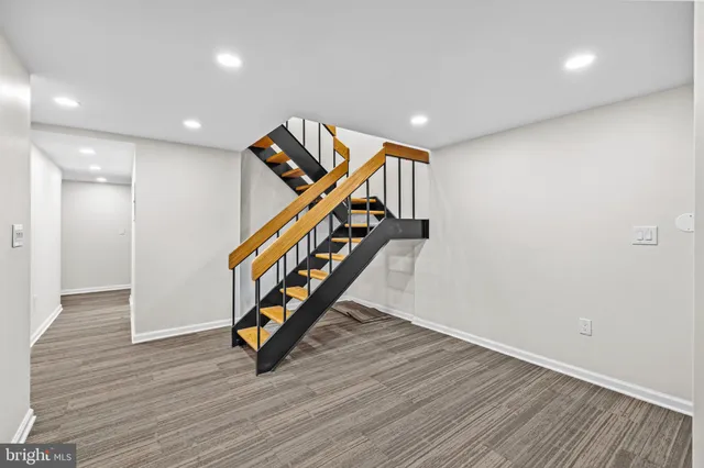 a kitchen with a sink cabinets and stainless steel appliances