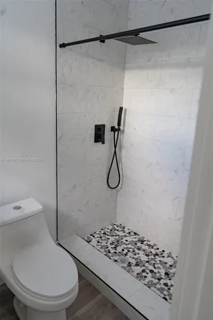 a bathroom with a toilet and a sink