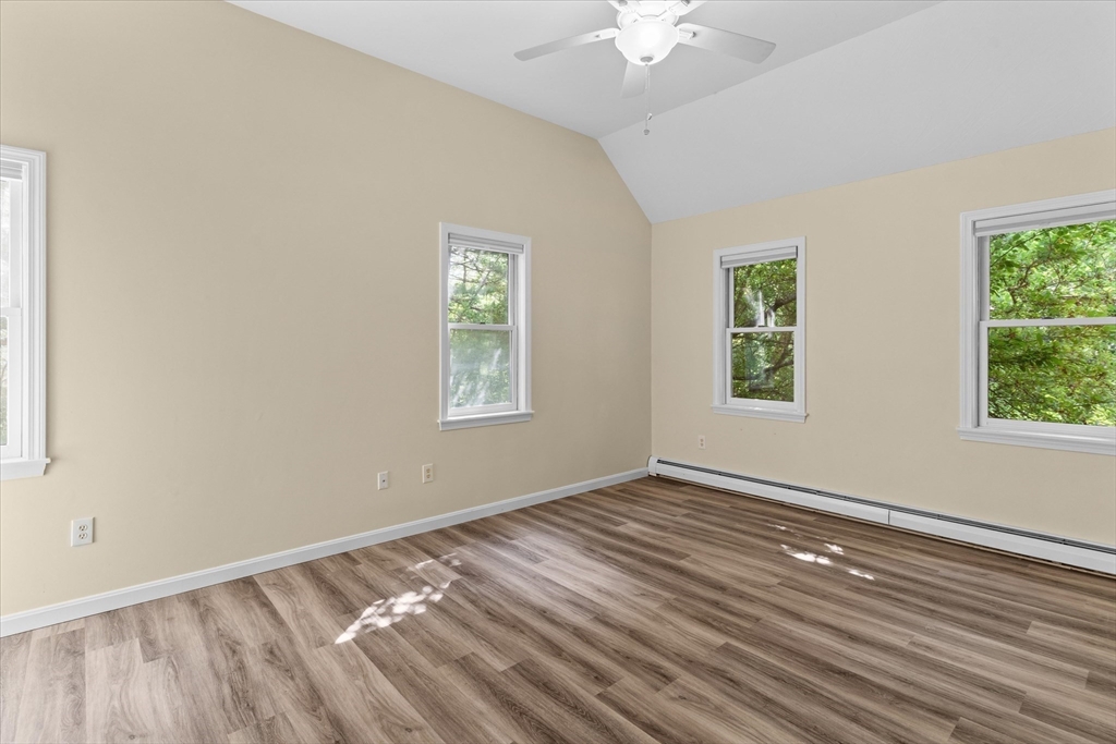 12 Easter Brook Road Lunenburg, MA 01462 - Photo 17 of 41 a view of an empty room with a window and wooden floor