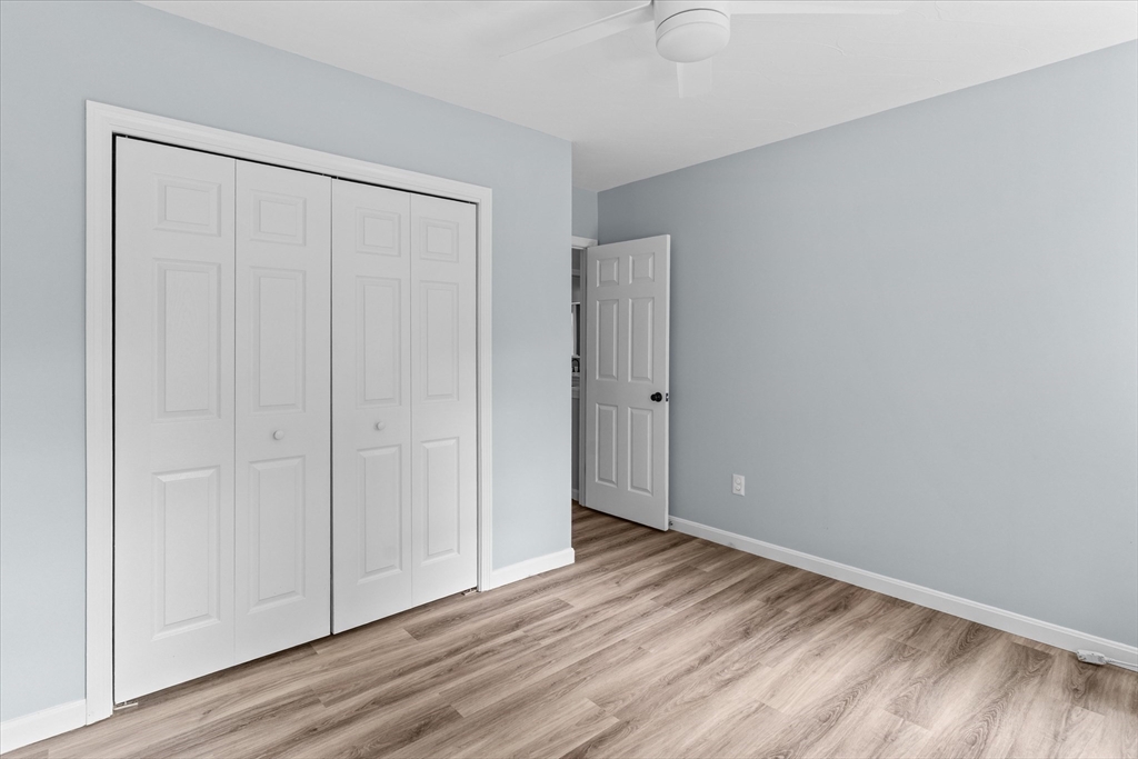 12 Easter Brook Road Lunenburg, MA 01462 - Photo 23 of 41 a view of an empty room with wooden floor