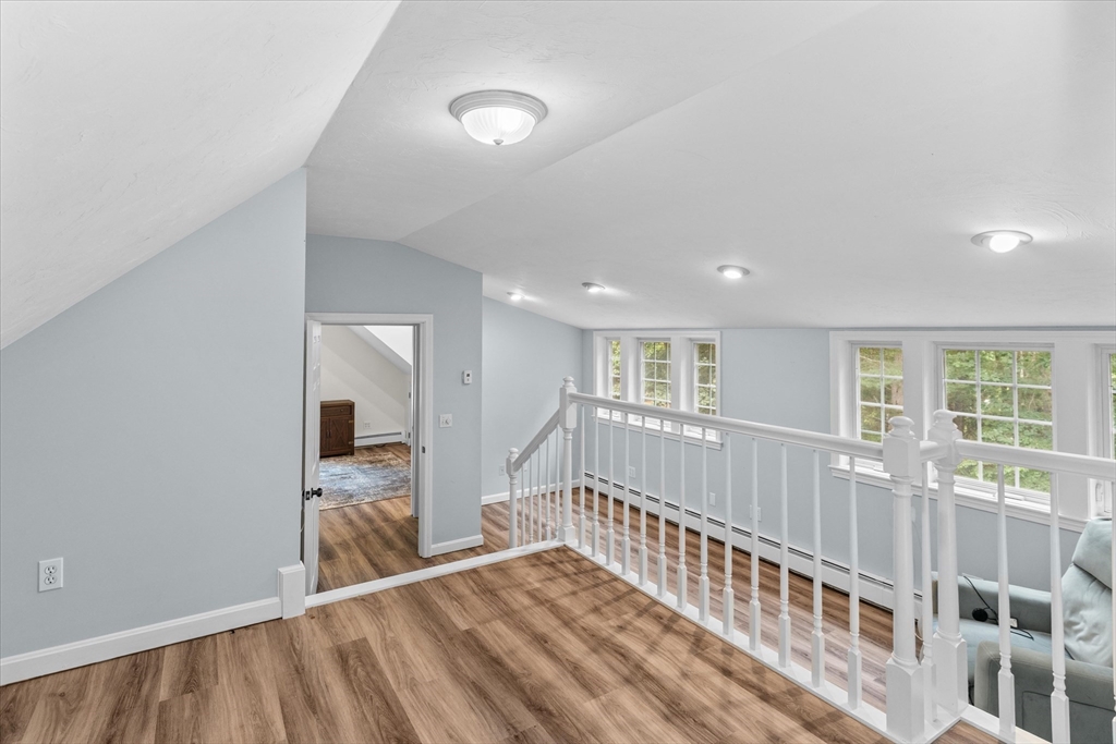 12 Easter Brook Road Lunenburg, MA 01462 - Photo 26 of 41 a view of hallway with a large window and wooden floor