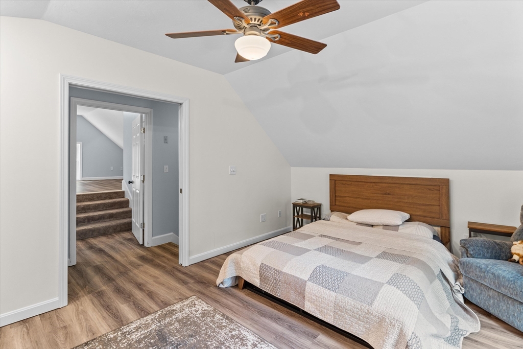 12 Easter Brook Road Lunenburg, MA 01462 - Photo 29 of 41 a bedroom with a bed and wooden floor