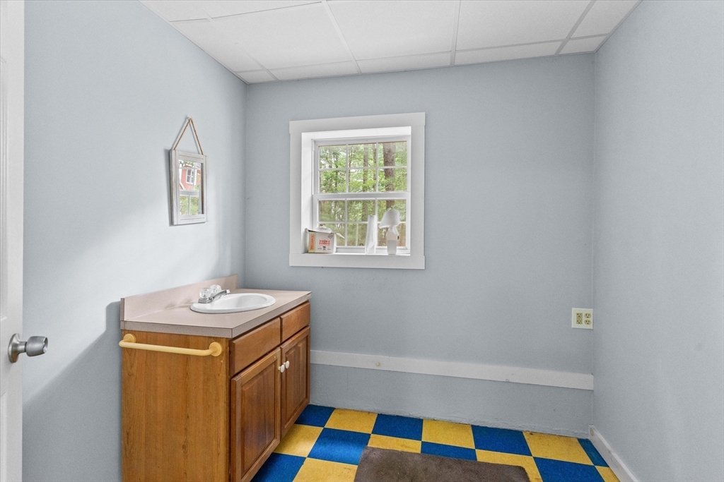 12 Easter Brook Road Lunenburg, MA 01462 - Photo 35 of 41 a bathroom with a sink a bathtub and a mirror
