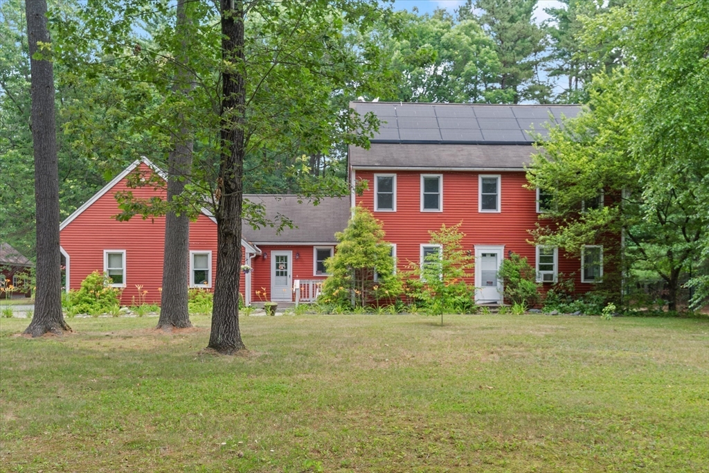 12 Easter Brook Road Lunenburg, MA 01462 - Photo 39 of 41 a view of a house with a yard and plants