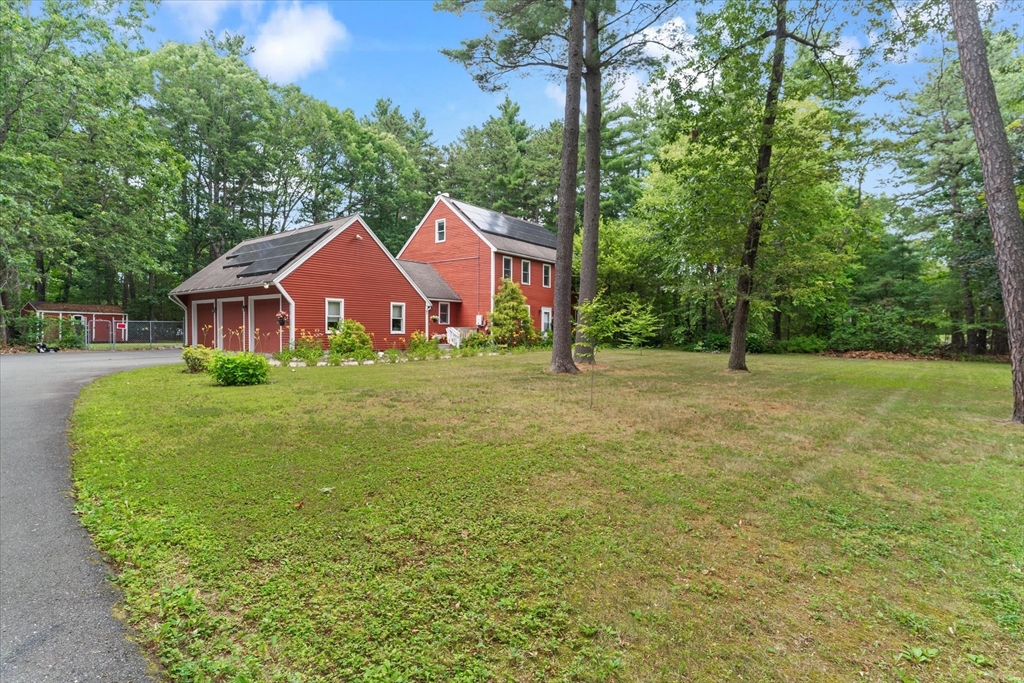 12 Easter Brook Road Lunenburg, MA 01462 - Photo 40 of 41 a view of a house with a yard