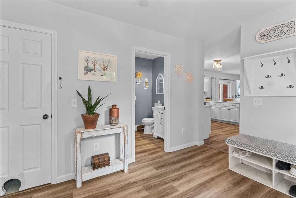 12 Easter Brook Road Lunenburg, MA 01462 - Photo 6 of 41 a living room with furniture and a fireplace