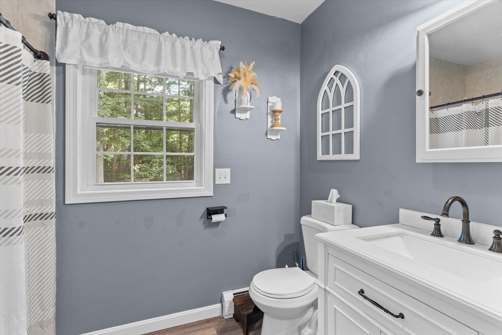 12 Easter Brook Road Lunenburg, MA 01462 - Photo 7 of 41 a bathroom with a sink a toilet and a window