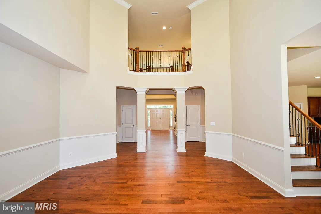 8536 Old Keene Mill Road Springfield, VA 22152 - Photo 13 of 30 a view of an entryway with wooden floor