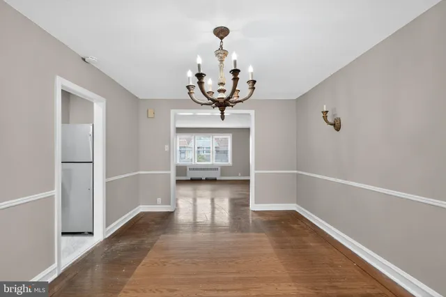 a view of a livingroom with wooden floor