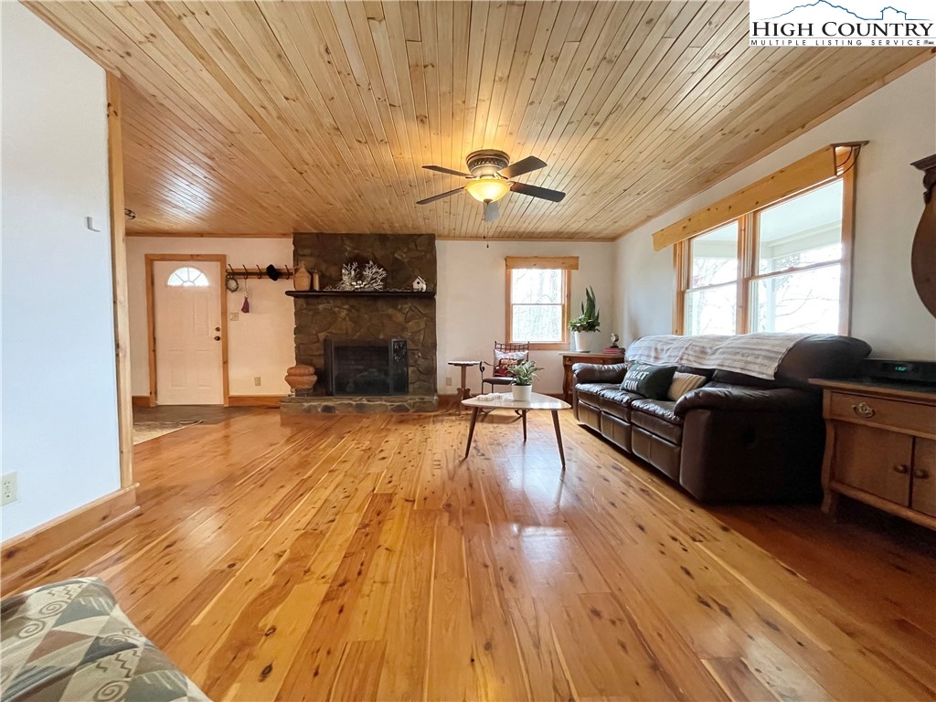 175 Woods Road Boone, NC 28607 - Photo 11 of 50 a living room with furniture and a fireplace