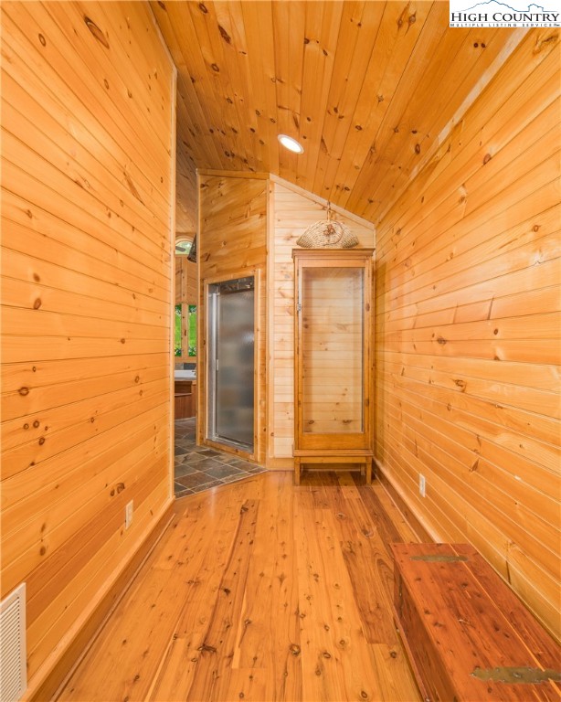 175 Woods Road Boone, NC 28607 - Photo 21 of 50 a view of a livingroom with wooden floor and a bathroom
