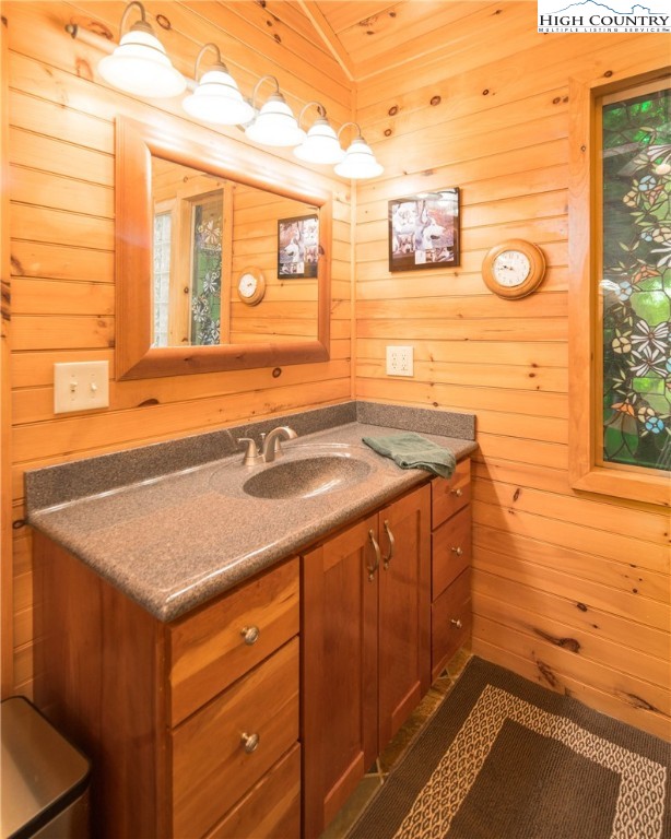 175 Woods Road Boone, NC 28607 - Photo 27 of 50 a bathroom with a sink and a mirror