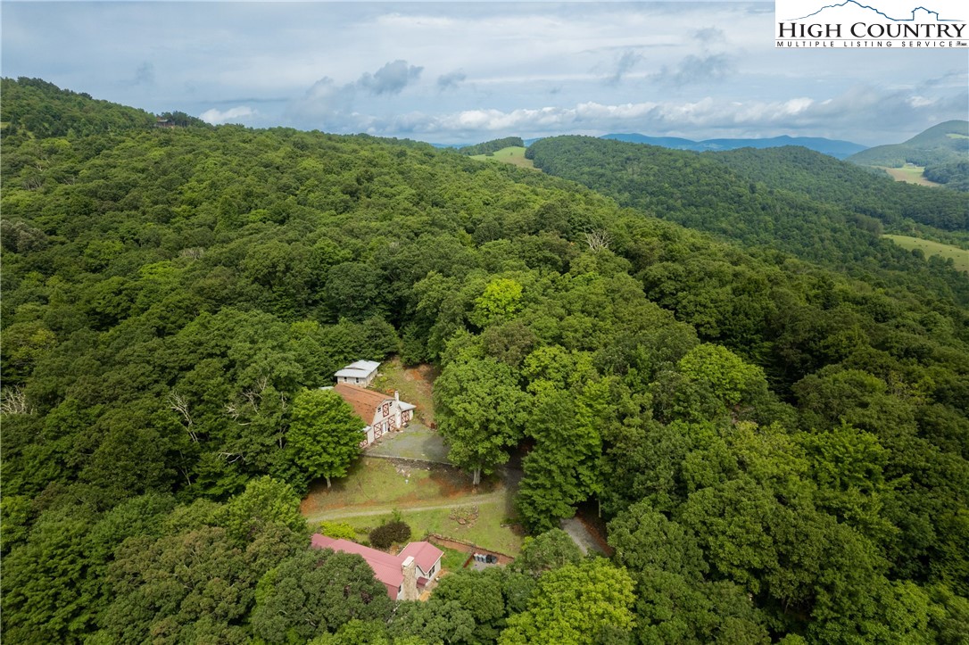 175 Woods Road Boone, NC 28607 - Photo 5 of 50 a aerial view of a house with a yard