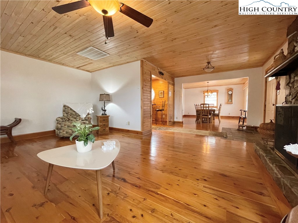 175 Woods Road Boone, NC 28607 - Photo 10 of 50 a lobby with furniture and a wooden floor