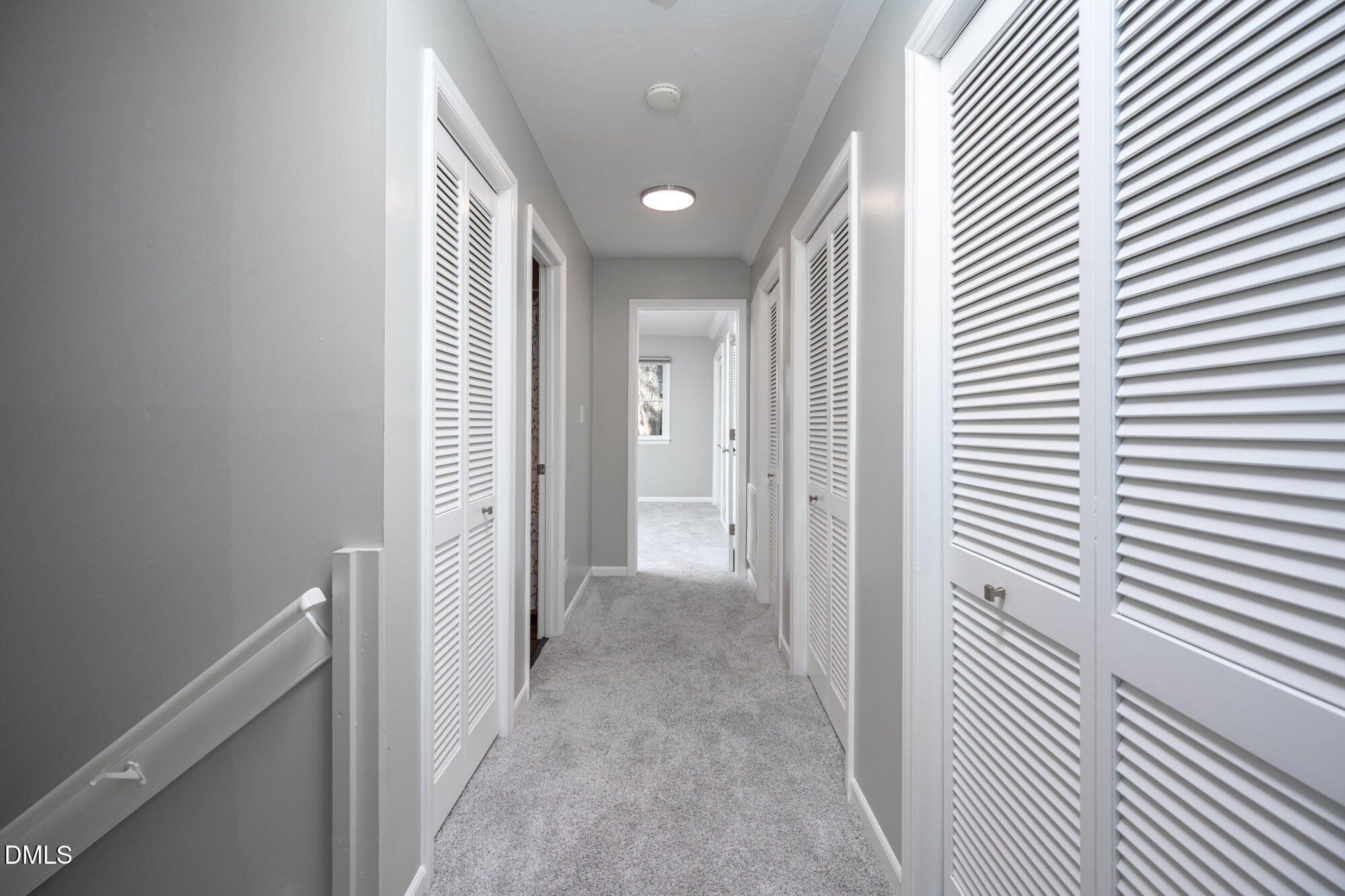 132 Hudson Hills Road Pittsboro, NC 27312 - Photo 21 of 43 a view of a hallway with wooden floor