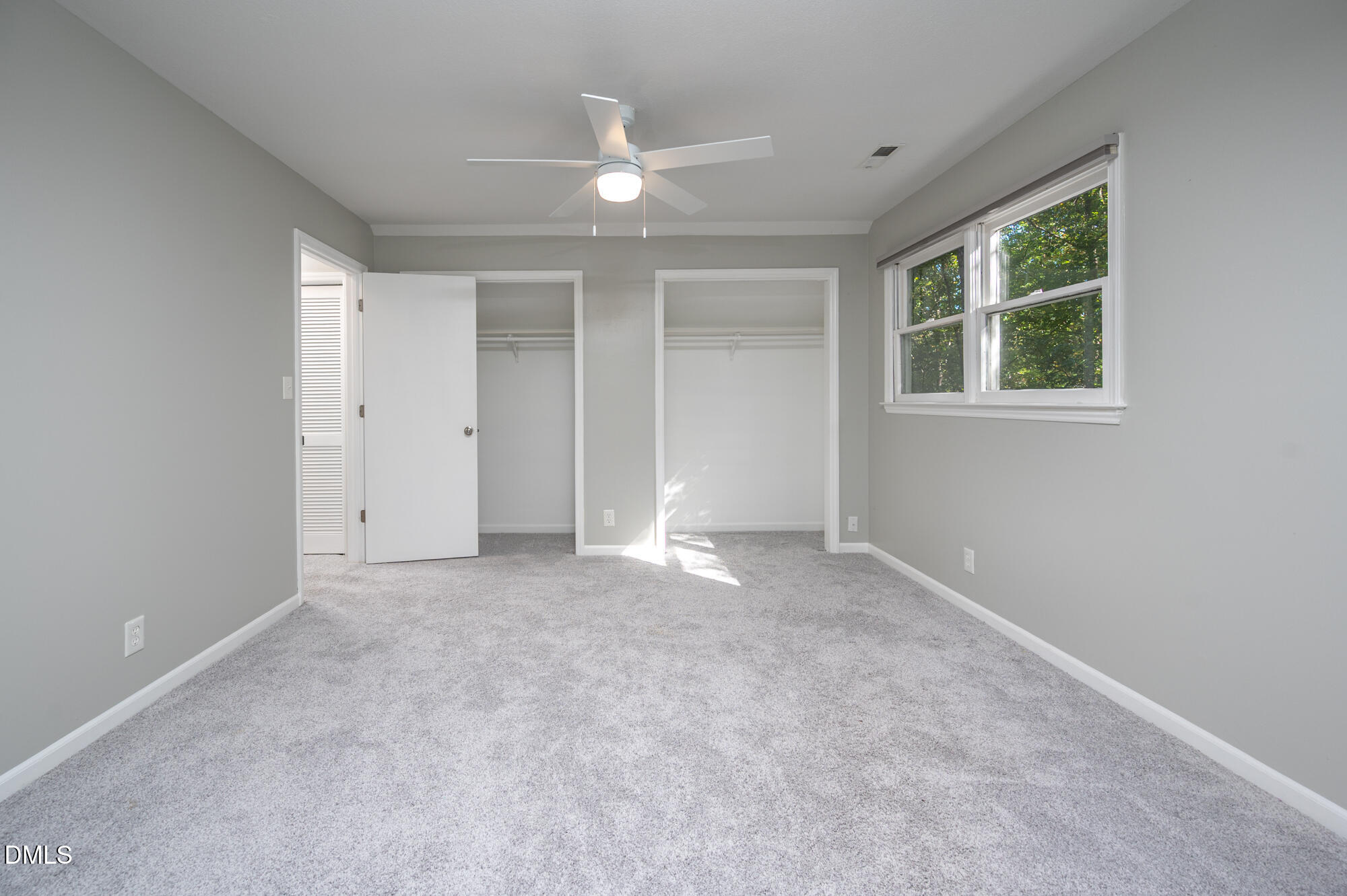 132 Hudson Hills Road Pittsboro, NC 27312 - Photo 24 of 43 an empty room with windows and closet