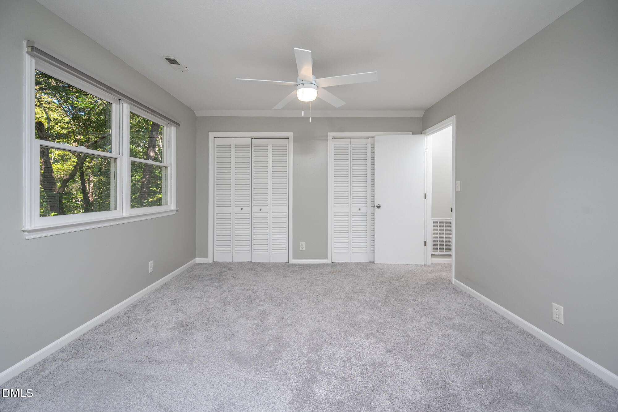 132 Hudson Hills Road Pittsboro, NC 27312 - Photo 30 of 43 a view of an empty room with a window