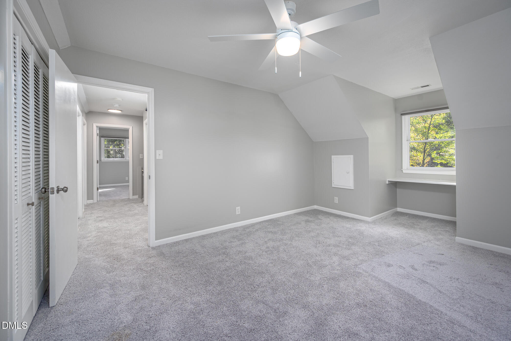132 Hudson Hills Road Pittsboro, NC 27312 - Photo 31 of 43 an empty room with windows and fan
