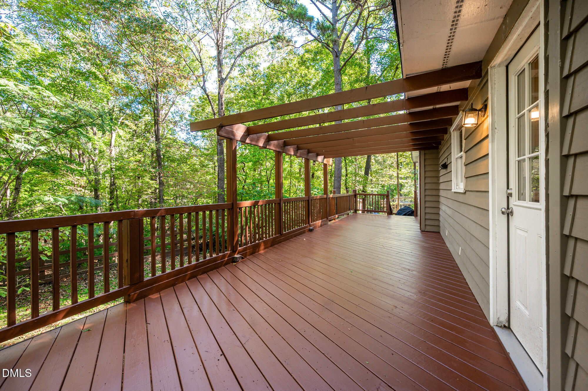 132 Hudson Hills Road Pittsboro, NC 27312 - Photo 33 of 43 a view of a room with wooden floor and iron stairs