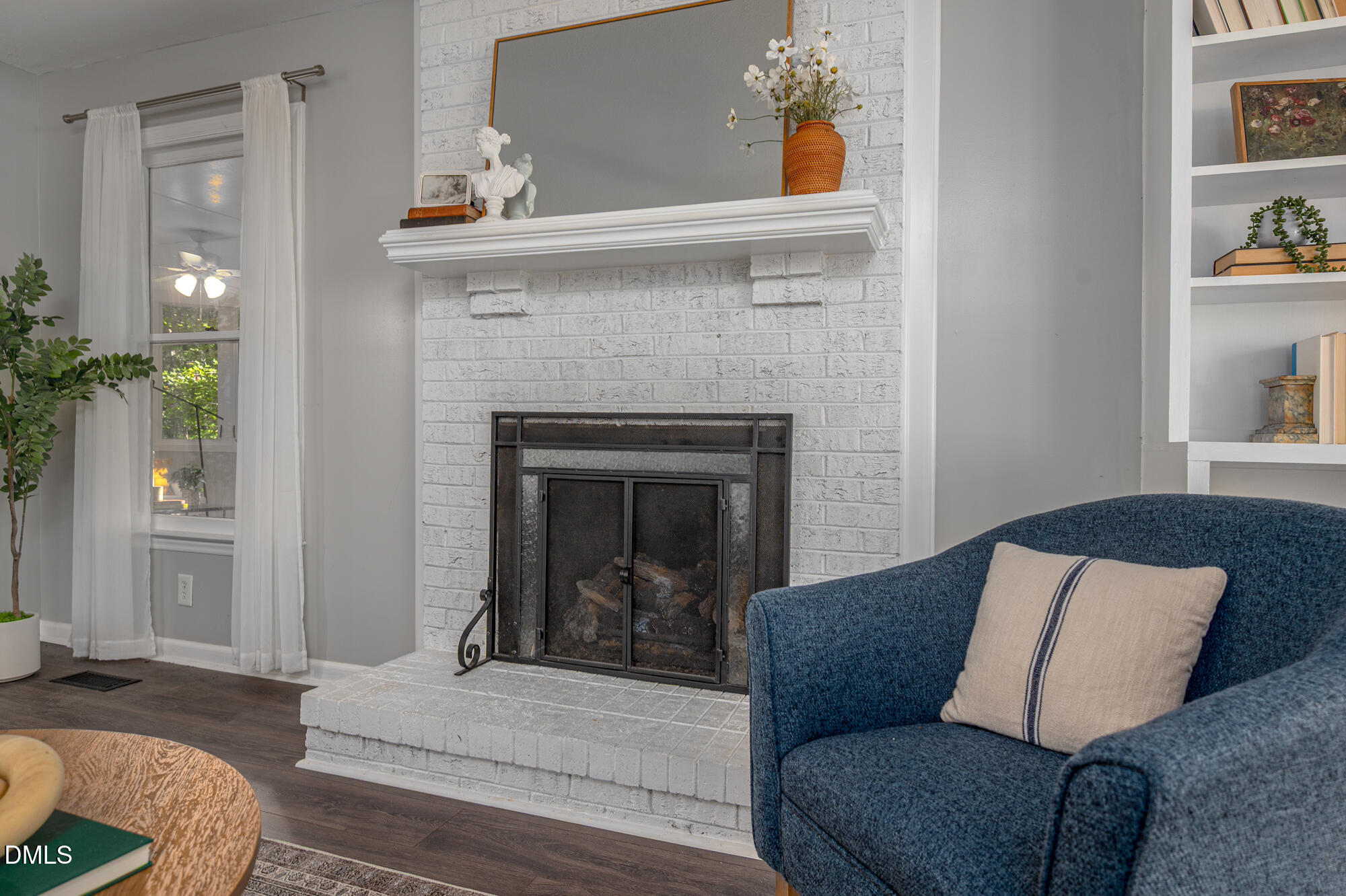 132 Hudson Hills Road Pittsboro, NC 27312 - Photo 4 of 43 a living room with furniture and a fireplace