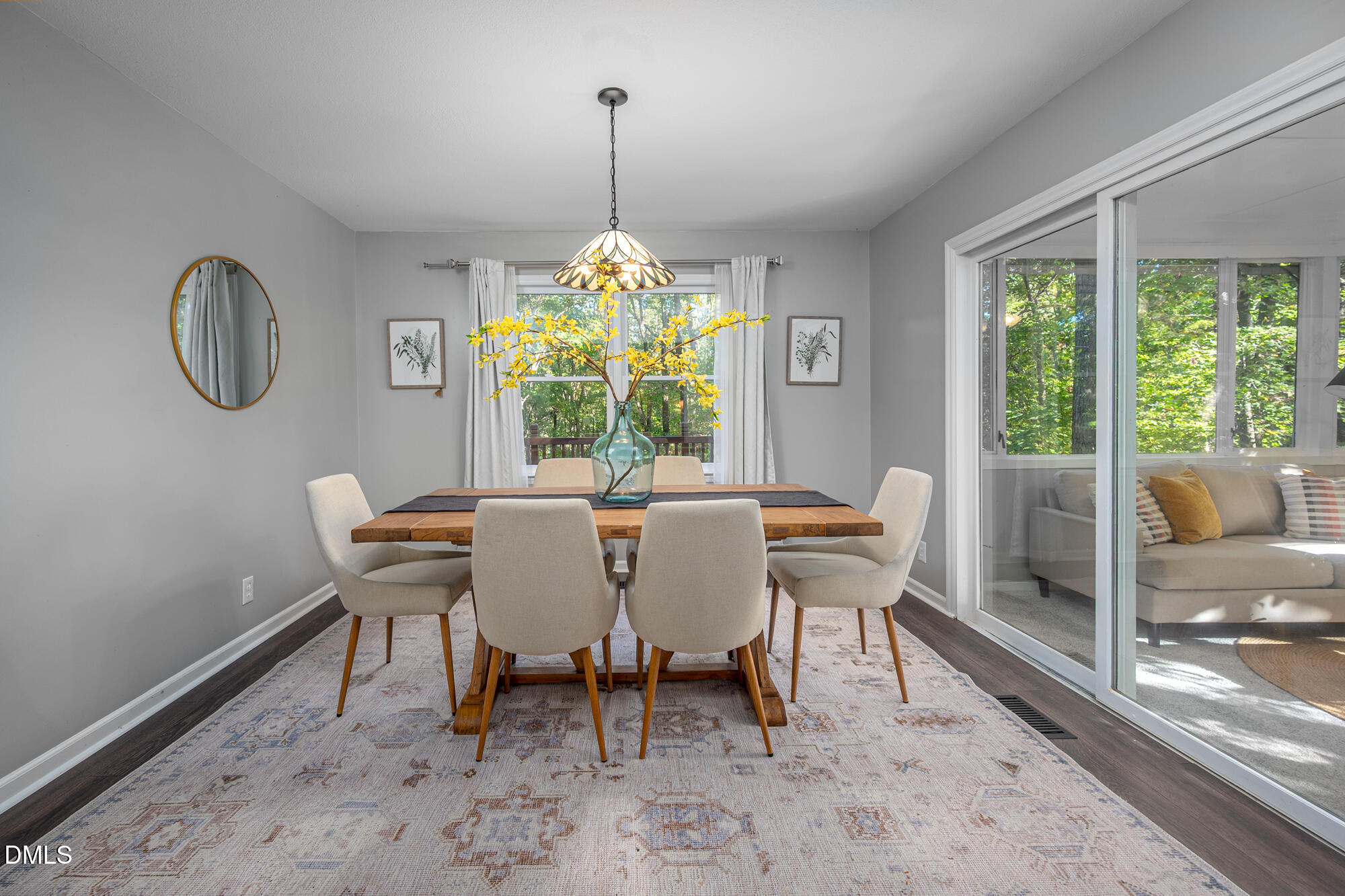132 Hudson Hills Road Pittsboro, NC 27312 - Photo 5 of 43 a dining room with furniture a chandelier and rug