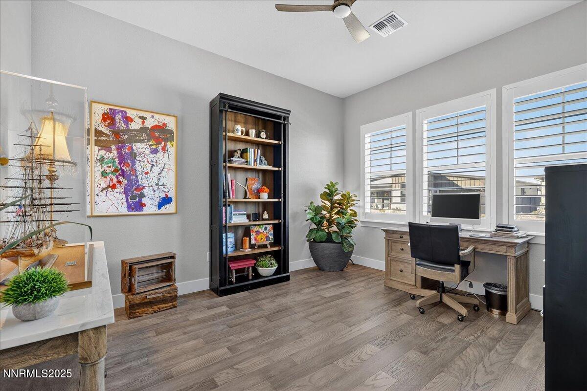 2160 Woodhouse Drive Reno, NV 89521 - Photo 13 of 38 a livingroom with workspace window and a couch