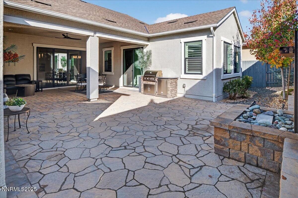 2160 Woodhouse Drive Reno, NV 89521 - Photo 29 of 38 a view of a house with backyard and sitting area