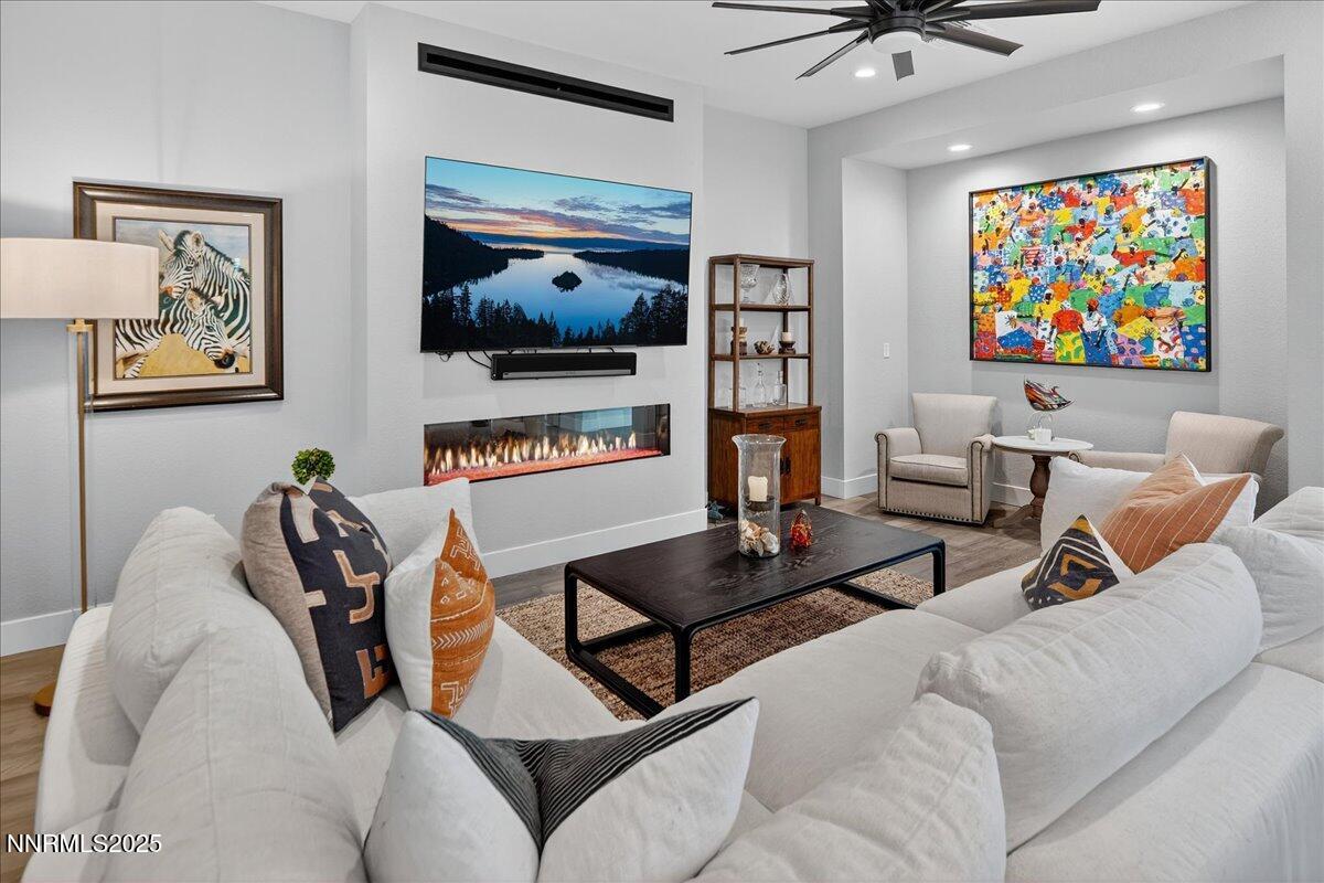 2160 Woodhouse Drive Reno, NV 89521 - Photo 3 of 38 a living room with furniture and a flat screen tv