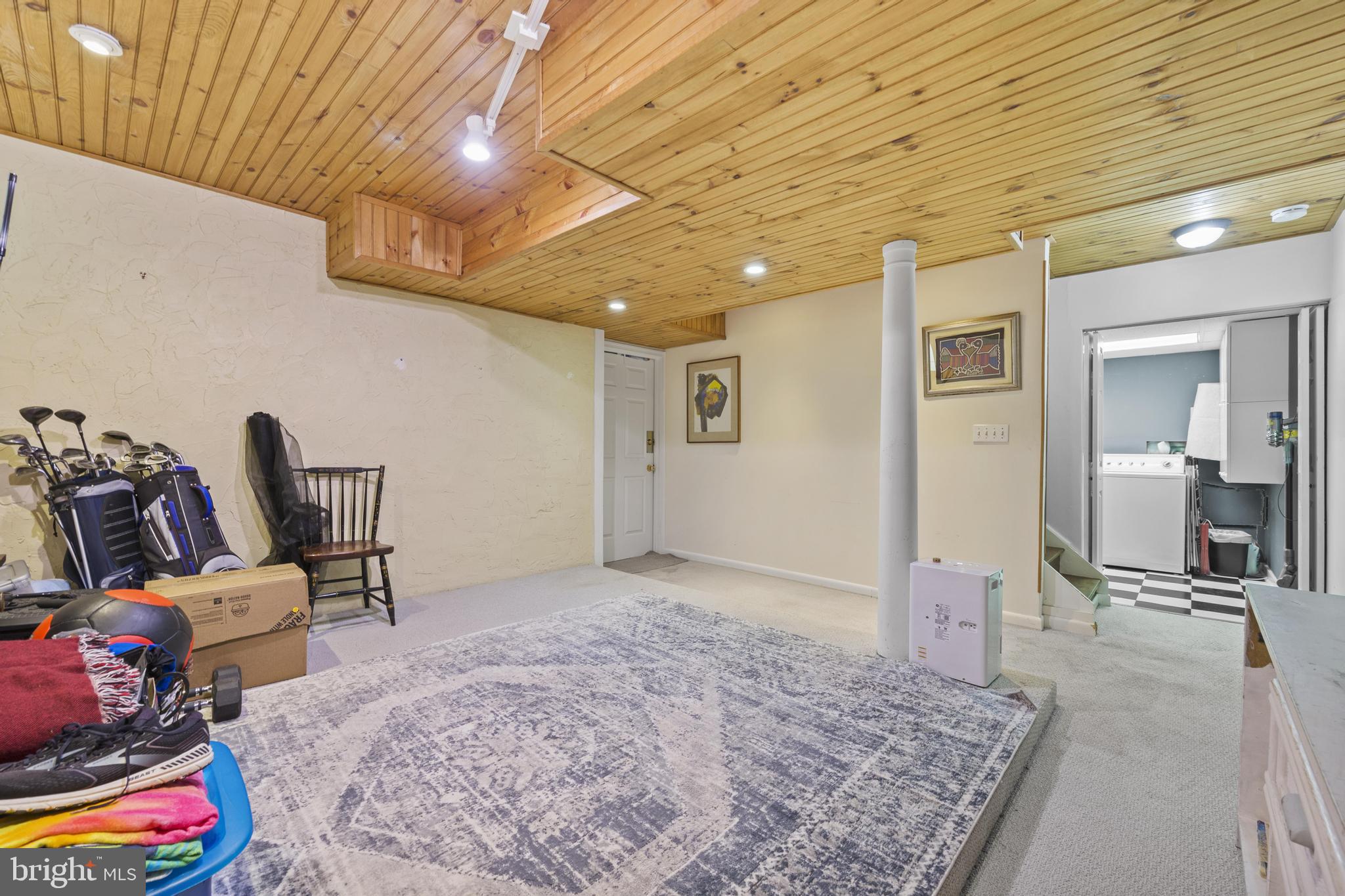 1561 Ritchie Lane Annapolis, MD 21401 - Photo 44 of 66 Spacious basement with wooden accents.