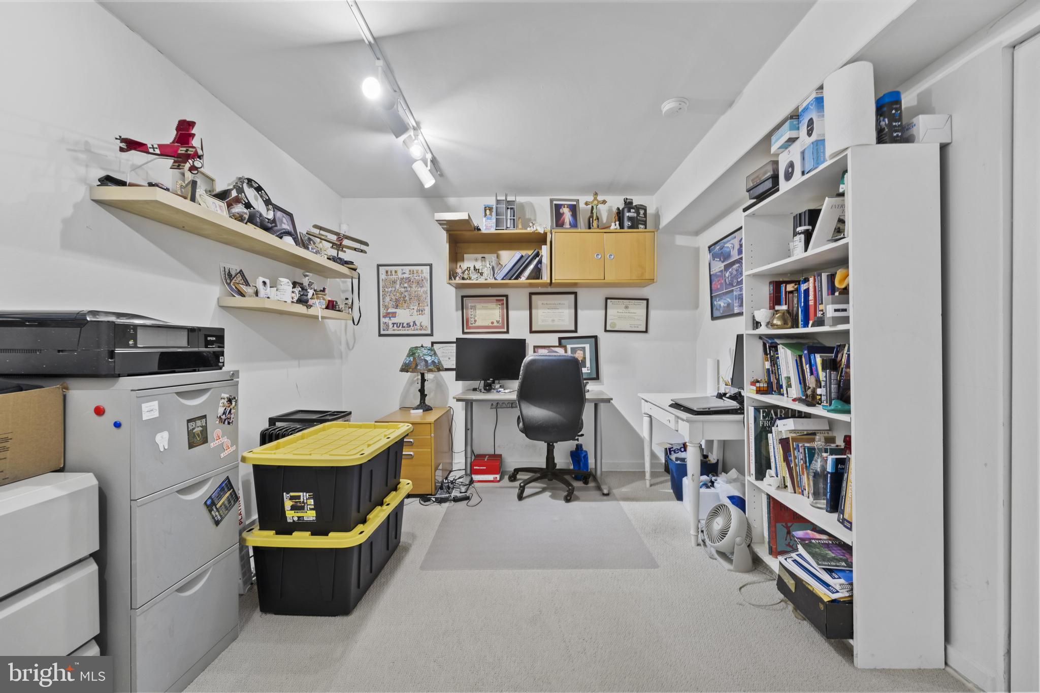 1561 Ritchie Lane Annapolis, MD 21401 - Photo 48 of 66 Versatile workspace with organized shelves.