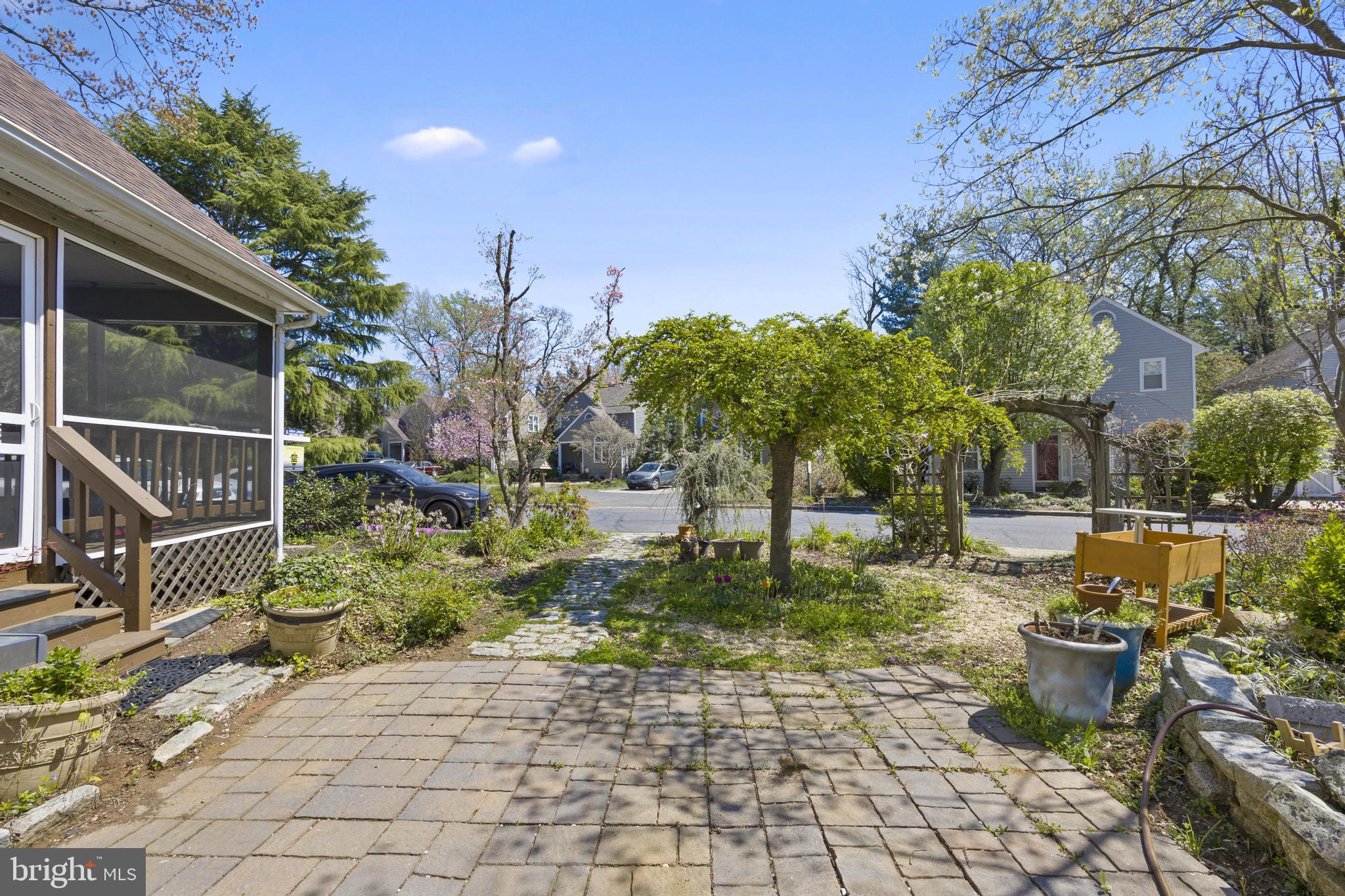 1561 Ritchie Lane Annapolis, MD 21401 - Photo 57 of 66 Charming garden path in sunny serenity.