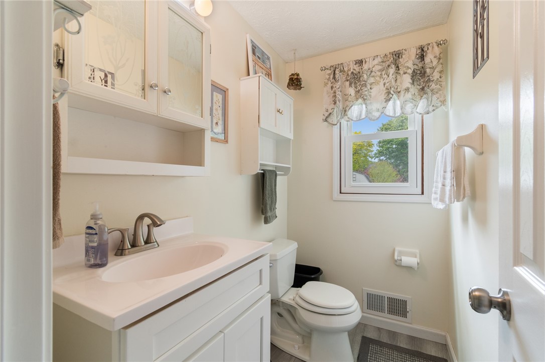 25 Spring Tree Lane Greece, NY 14612 - Photo 15 of 40 The HALF BATH on the first floor - conveniently l