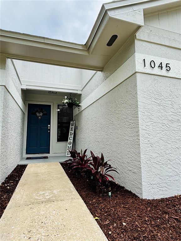 1045 Shaffer Trail Oviedo, FL 32765 - Photo 3 of 30 a view of a entryway door