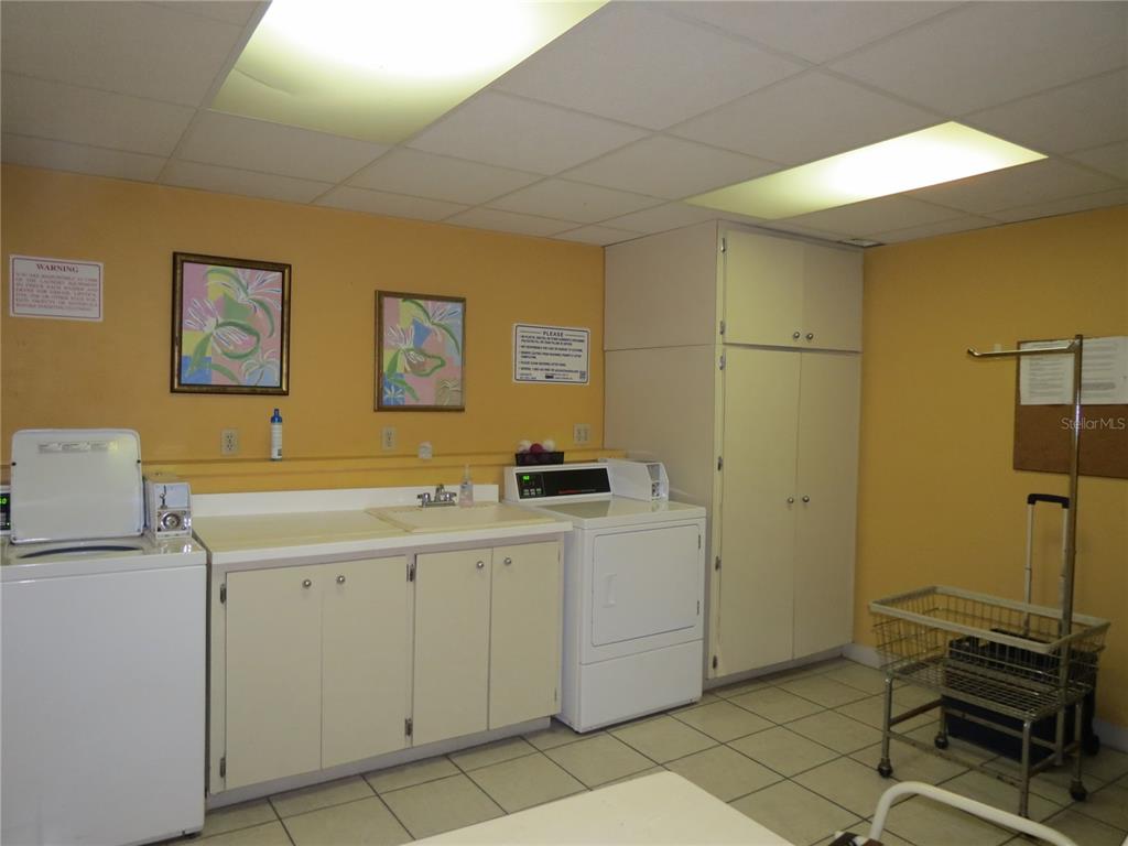 615 South Palm Avenue, Unit 4 Sarasota, FL 34236 - Photo 15 of 16 a view of a storage & utility room with two washing machine