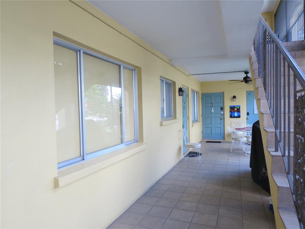 615 South Palm Avenue, Unit 4 Sarasota, FL 34236 - Photo 3 of 16 a view of livingroom with hardwood floor and a hallway