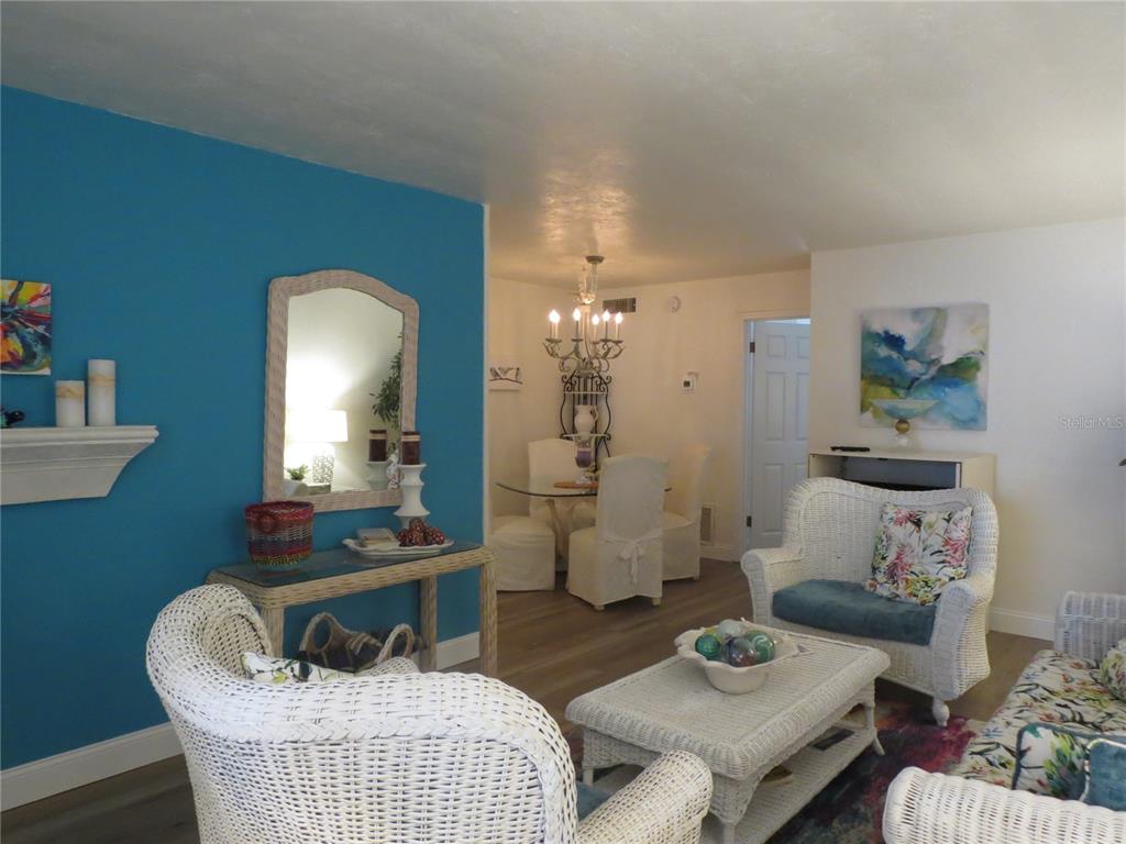 615 South Palm Avenue, Unit 4 Sarasota, FL 34236 - Photo 6 of 16 a living room with furniture and wooden floor