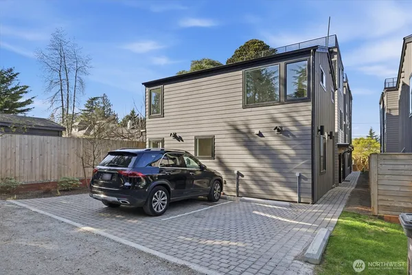 a view of a car in front of house