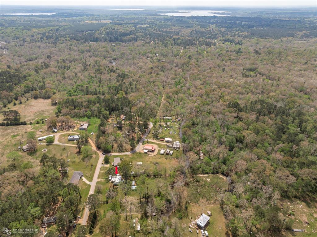 224 Prysock Road Doyline, LA 71023 - Photo 35 of 38 Drone / aerial view of a heavily wooded area
