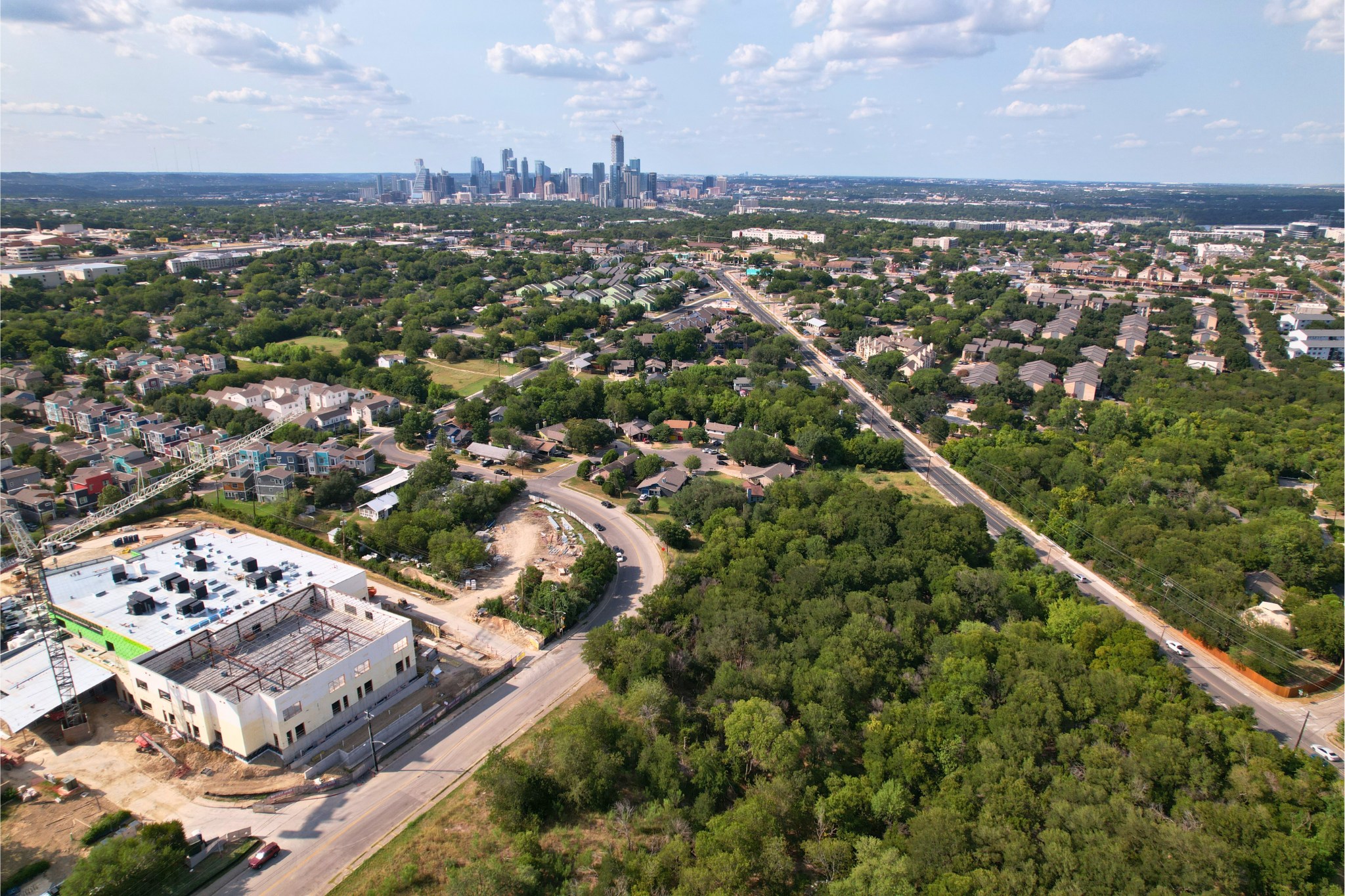 2813-2827 Metcalfe Road Austin, TX 78741 - Photo 1 of 7 an aerial view of a city