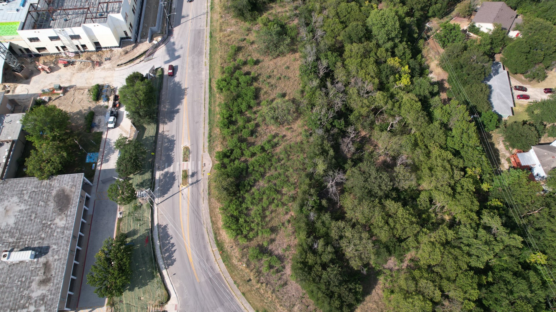 2813-2827 Metcalfe Road Austin, TX 78741 - Photo 3 of 7 an aerial view of a house with a yard