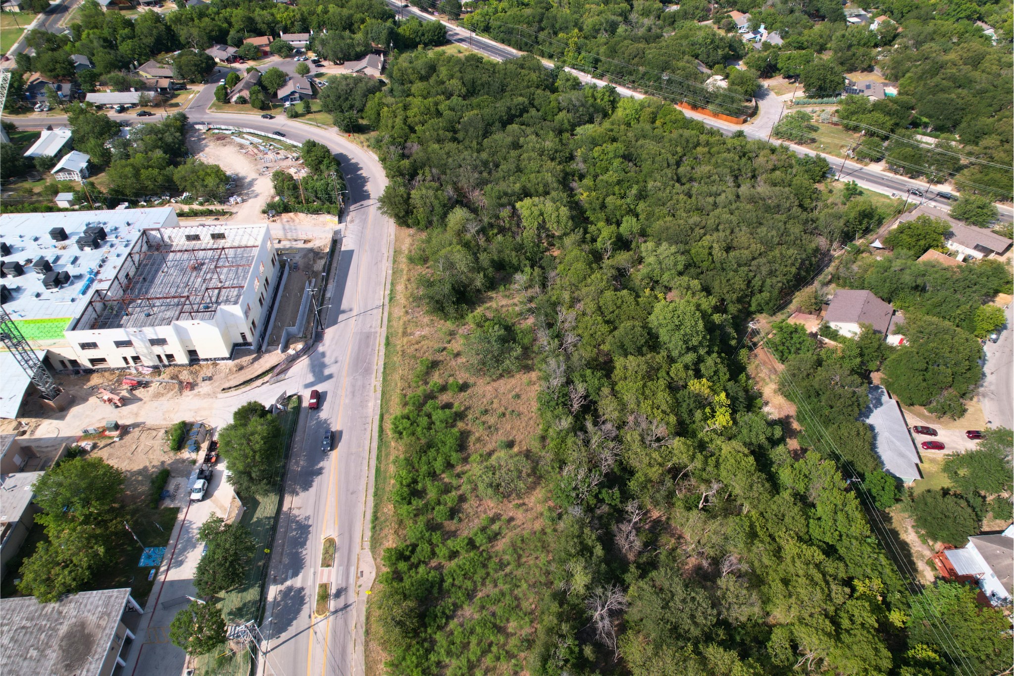 2813-2827 Metcalfe Road Austin, TX 78741 - Photo 6 of 7 an aerial view of residential houses with outdoor space