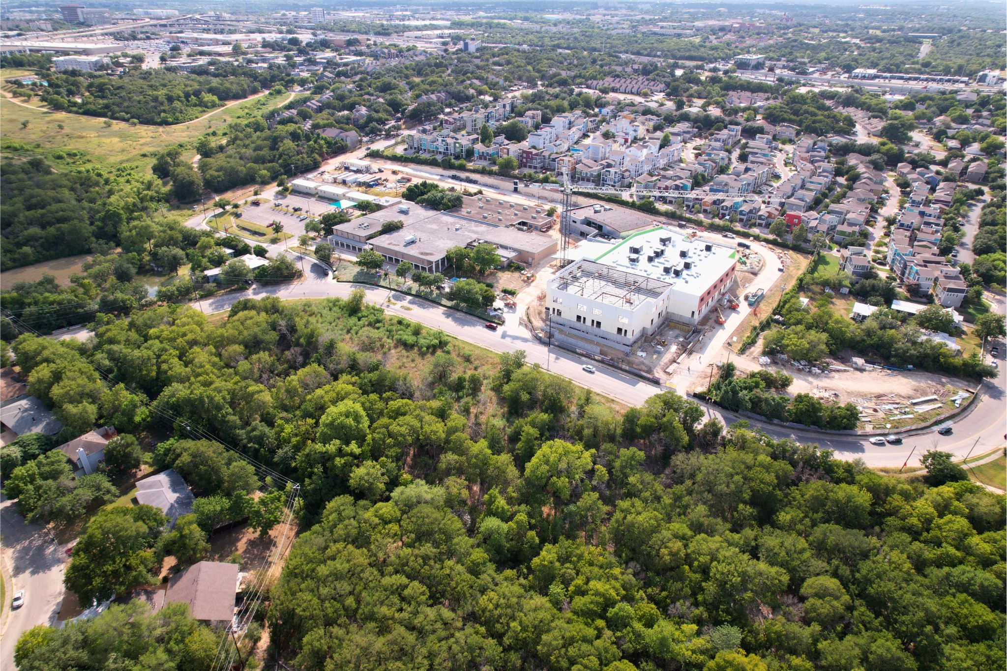 2813-2827 Metcalfe Road Austin, TX 78741 - Photo 7 of 7 an aerial view of a city with lots of residential buildings