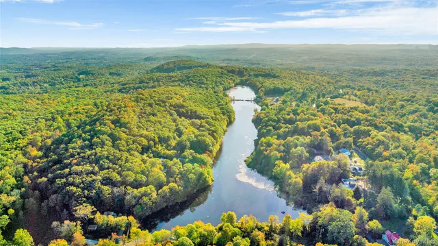 a view of a lake with a garden