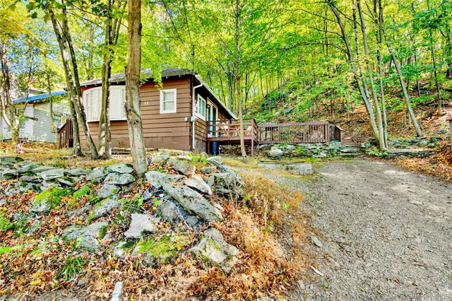 a backyard of a house with lots of green space