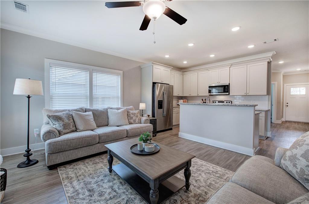 200 Daisy Court Cartersville, GA 30121 - Photo 34 of 73 a living room with furniture kitchen view and a window