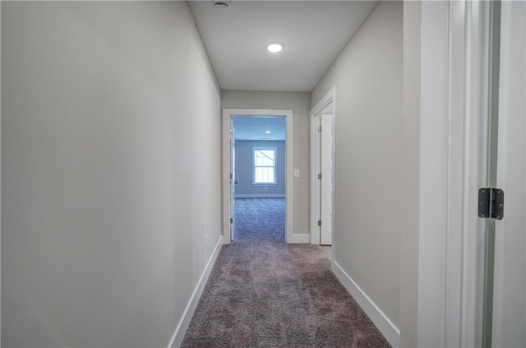 200 Daisy Court Cartersville, GA 30121 - Photo 40 of 73 a view of a hallway with wooden floor